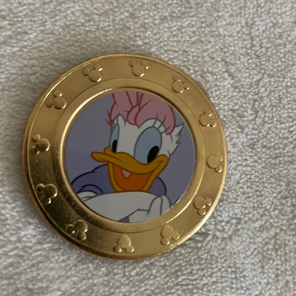 Frankford Daisy purple background coin